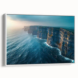 Framed canvas wall art showcasing a dramatic landscape of cliffs in muted earth tones, elegantly displayed from a side view against a white background, perfect for modern decor.