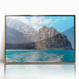 Framed acrylic wall art showcasing a stunning landscape of cliffs at sunset, featuring golden hues and intricate details, perfect for modern home decor.