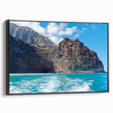 Framed canvas wall art showcasing a stunning cliff landscape design, featuring rich colors and intricate details, displayed with a sleek black frame for modern decor.