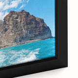 Framed canvas artwork showcasing a vibrant landscape of rocky cliffs under a blue sky, emphasizing intricate textures and colors, ideal for modern home decor.