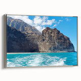 Framed canvas wall art featuring a stunning landscape of cliffs, showcasing intricate details and a silver frame, ideal for modern home decor.