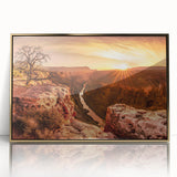 Framed acrylic wall art showcasing a stunning landscape of rugged cliffs and serene waters, accented with a gold frame, perfect for modern decor.