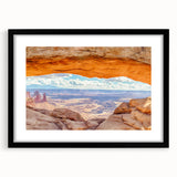 Framed wall art featuring a stunning landscape of cliffs, presented in a sleek black frame with a mat, ideal for enhancing home decor and showcasing natural beauty.