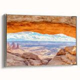 Framed canvas wall art featuring a stunning cliff landscape design in silver tones, showcasing dramatic rock formations and a serene sky, perfect for modern decor.