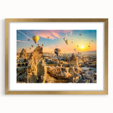 Framed wall art print showcasing a breathtaking landscape of cliffs, featuring rich gold accents and a white mat, ideal for modern home decor.