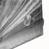 Close-up of a modern acrylic wall art piece showcasing vibrant landscapes and dramatic cliffs, ideal for enhancing home decor with nature-inspired elegance.