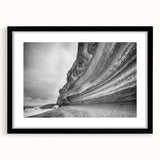 Framed wall art collection featuring a stunning landscape of cliffs, presented in a sleek black frame with a mat. Ideal for home decor to enhance any living space.