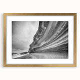 Framed landscape wall art featuring cliffs and nature, with a gold mat and frame, showcasing vibrant colors for an elegant home decor accent.