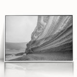 Framed wall art showcasing a serene landscape of cliffs with vibrant colors, set in a white frame, ideal for home decor and interior design enhancement.