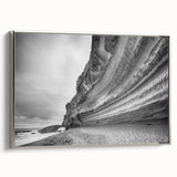 Framed canvas wall art showcasing a stunning landscape of cliffs, featuring vibrant colors and intricate details, set against a silver frame for an elegant finish.