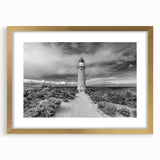 Gold-framed wall art featuring a stunning landscape of cliffs, showcasing vibrant colors and intricate details, perfect for modern home decor.