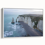 Framed canvas wall art featuring a serene landscape of cliffs with vibrant colors, designed for modern decor, showcased from a side view against a white background.