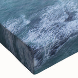 Close-up of a stretched canvas wall art piece showcasing a vibrant landscape of cliffs, with intricate textures and colors that enhance its natural beauty, perfect for home decor.