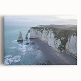Stretched canvas wall art featuring a vibrant landscape of rugged cliffs under a bright blue sky, perfect for adding a dramatic touch to any room decor.