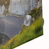 Close-up of a vibrant acrylic glass wall art piece showcasing a stunning landscape with dramatic cliffs, perfect for adding a modern touch to home decor.