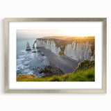 Framed landscape wall art showcasing cliffs in vibrant colors, with a silver mat and frame, perfect for home decor, adding elegance to any space.