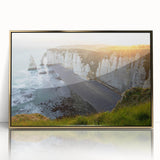 Framed wall art featuring a stunning landscape of cliffs in vibrant colors, accented with a sleek gold frame, perfect for enhancing home decor.