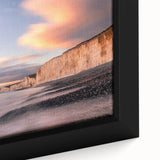 Framed canvas artwork depicting a vibrant landscape with dramatic cliffs and lush greenery, showcasing rich colors and intricate details, ideal for home decor.