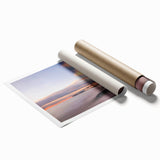 Vibrant rolled wall art print showcasing a stunning landscape of cliffs with rich colors, perfect for home decor. Packaged securely in a cardboard tube.