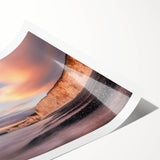 Vibrant wall art print showcasing a breathtaking landscape with dramatic cliffs and a serene sky, rolled for easy shipping and display. Ideal for home decor enthusiasts seeking nature-inspired artwork.