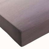 Close-up of a stretched canvas featuring a vibrant landscape wall art design, showcasing dramatic cliffs and lush greenery, perfect for home decor enhancement.