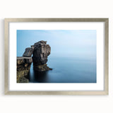 Framed wall art featuring a stunning landscape of cliffs with a silver mat, perfect for enhancing modern decor in living rooms or offices.