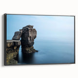 Framed canvas wall art showcasing a stunning landscape of cliffs, presented in a sleek black frame, perfect for adding elegance to any room decor.