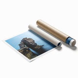 Stunning rolled print showcasing a vibrant landscape of cliffs at sunset, featuring rich orange and purple hues, perfect for home decor and art enthusiasts.