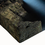 Close-up of a stretched canvas wall art piece showcasing vibrant landscapes and dramatic cliffs, ideal for modern home decor. Perfect for bringing nature indoors.