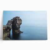 Stretched canvas wall art showcasing a stunning landscape of cliffs at sunset, featuring vibrant colors and intricate details, perfect for home decor.