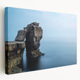 Stretched canvas wall art showcasing a vibrant landscape of cliffs under a blue sky, perfect for adding a serene touch to contemporary home decor.