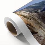 Stunning rolled canvas depicting a serene landscape with dramatic cliffs and vibrant colors, perfect for enhancing home decor with natural beauty.