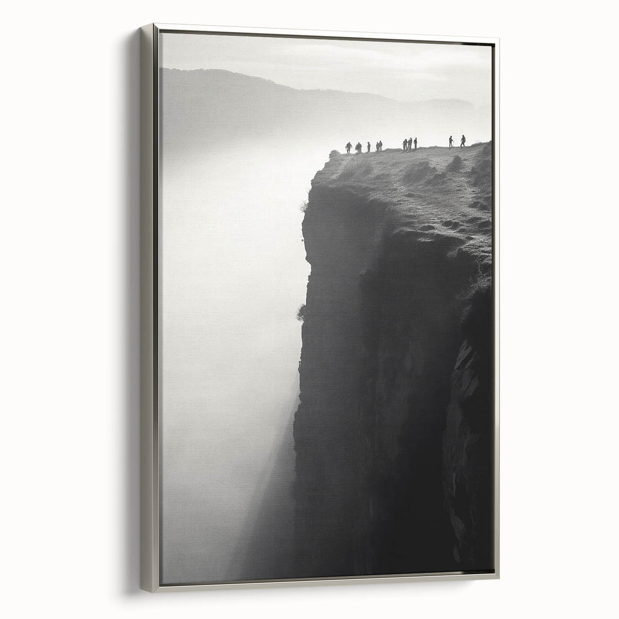 Framed canvas wall art showcasing a scenic cliff landscape with vibrant colors and intricate details, elegantly bordered in silver for a modern touch. Ideal for enhancing home decor or office spaces.