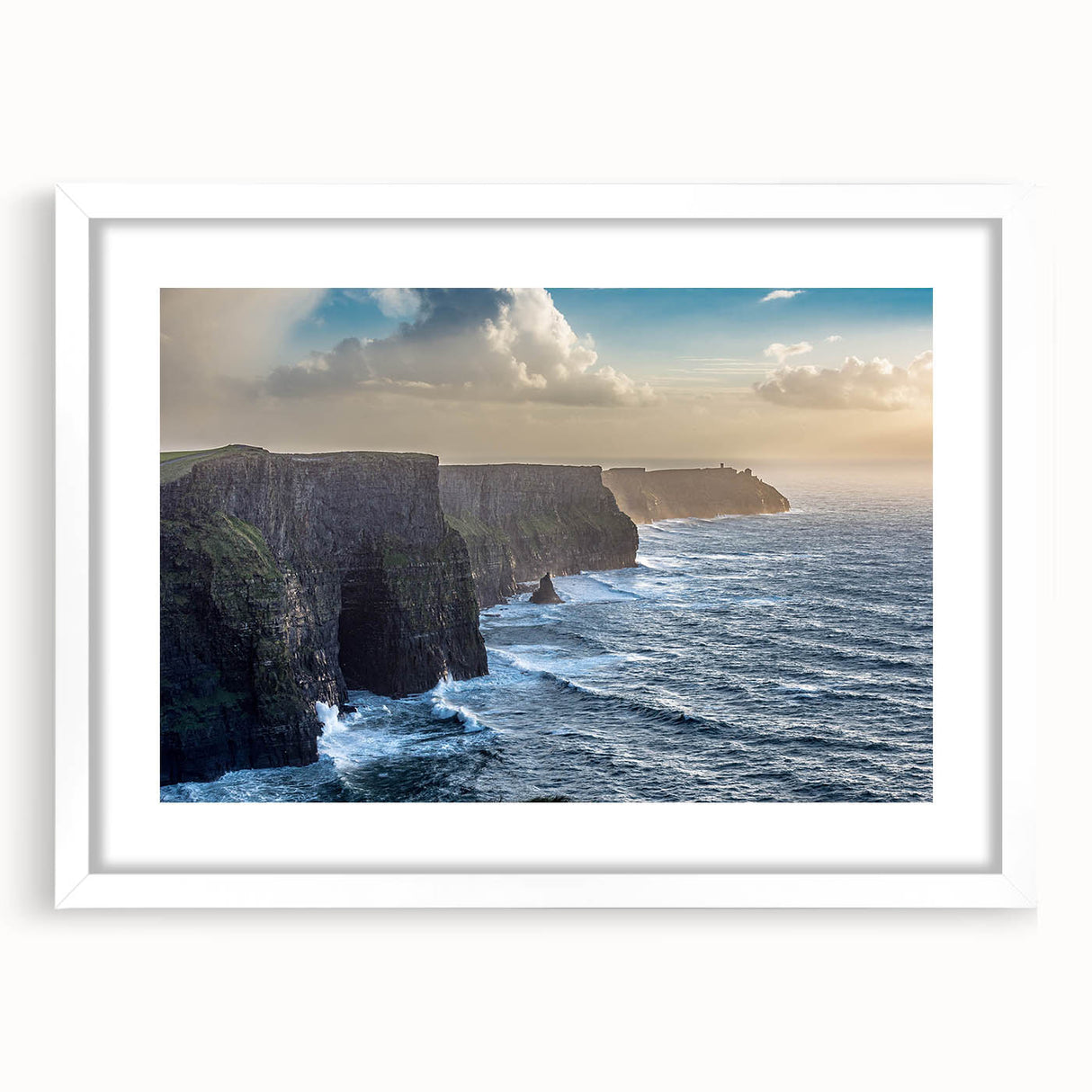 Elegant framed wall art featuring a stunning landscape of cliffs and mountains, presented with a white mat, perfect for modern home decor. Ideal for enhancing living spaces with natural beauty.