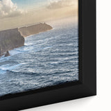 Close-up of a framed canvas artwork showcasing a vibrant landscape of cliffs, with rich colors and intricate details, perfect for home decor and interior design.