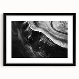 Framed black wall art print showcasing a stunning landscape of cliffs, featuring vibrant colors and intricate details, perfect for modern home décor.