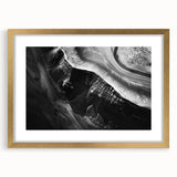 Framed landscape wall art featuring stunning cliffs in soft hues, accented with a gold mat, ideal for enhancing modern home decor and adding elegance.