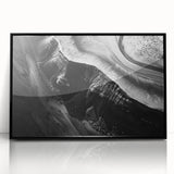 Framed acrylic wall art featuring a serene landscape of cliffs with a black frame, showcasing vibrant colors and intricate details, perfect for home decor.