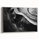 Framed canvas wall art showcasing a striking landscape of cliffs, with silver accents and a contemporary design, perfect for modern home decor.