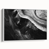 Framed wall art collection showcasing a stunning landscape of cliffs in earthy tones, displayed from a side view against a white backdrop, ideal for modern decor.