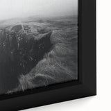 Close-up of a framed canvas wall art piece showcasing a vibrant landscape of cliffs, featuring rich colors and intricate details, perfect for modern home decor.