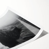 Stunning rolled print of a coastal landscape featuring dramatic cliffs and vibrant ocean hues, ideal for enhancing home decor with a touch of nature’s beauty.