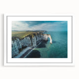 Framed landscape wall art collection showcasing majestic cliffs with vibrant colors, set in a sleek white mat, perfect for modern home decor.
