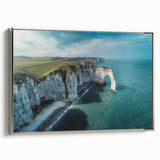Framed canvas wall art depicting a serene landscape of cliffs with a silver frame, showcasing vibrant colors and intricate details, perfect for home decor.