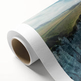 Vibrant rolled canvas showcasing a stunning landscape of cliffs and ocean, perfect for home decor or office spaces, securely packaged in a protective tube.