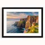 Black-framed landscape wall art depicting dramatic cliffs and ocean views, elegantly matted for a sophisticated presentation, ideal for modern home decor.