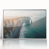 Framed wall art showcasing a stunning cliff landscape design with vibrant colors and intricate details, set against a sleek white frame, ideal for modern decor.