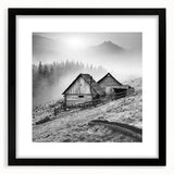 Framed wall art showcasing a serene countryside landscape with vibrant colors, elegantly matted and finished in a sleek black frame, perfect for home decor.