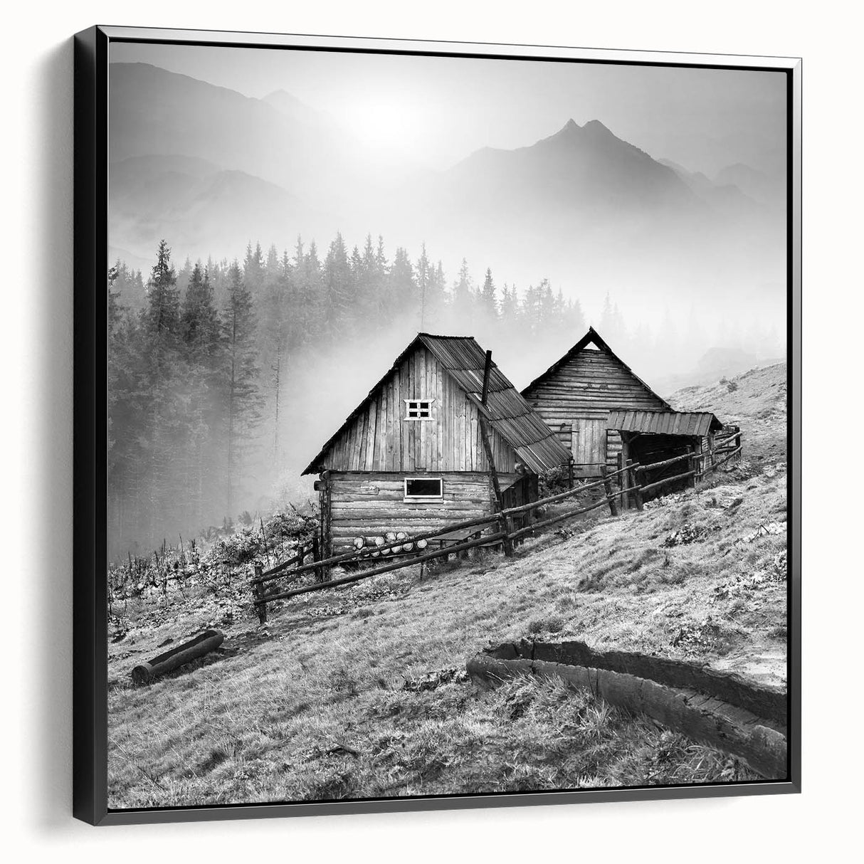 Framed canvas wall art showcasing a serene countryside landscape design, featuring rich green fields and a clear blue sky, viewed from a black side angle.