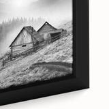 Close-up of a framed canvas wall art depicting a picturesque countryside landscape, featuring lush green fields, a serene blue sky, and soft, rolling hills. The artwork adds a tranquil vibe to any home decor.